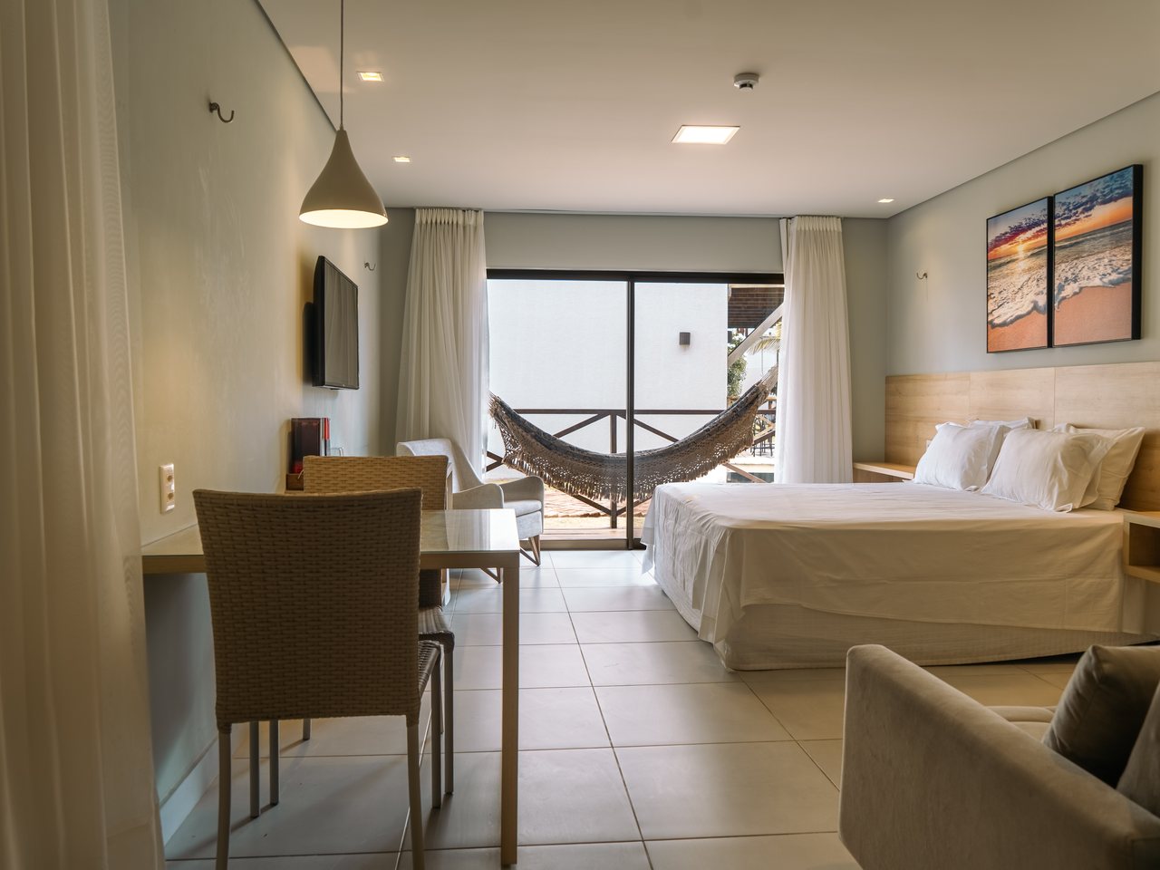 Villas BobZ Concept — sala de estar com varanda
