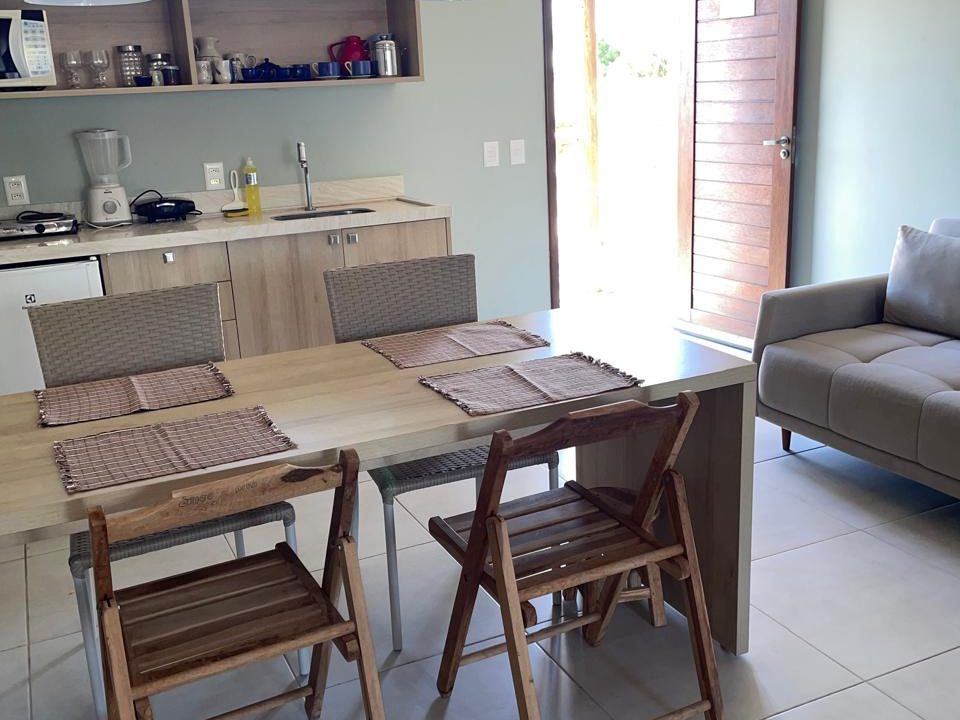 Villas BobZ Prime — sala de estar e jantar integradas com a cozinha